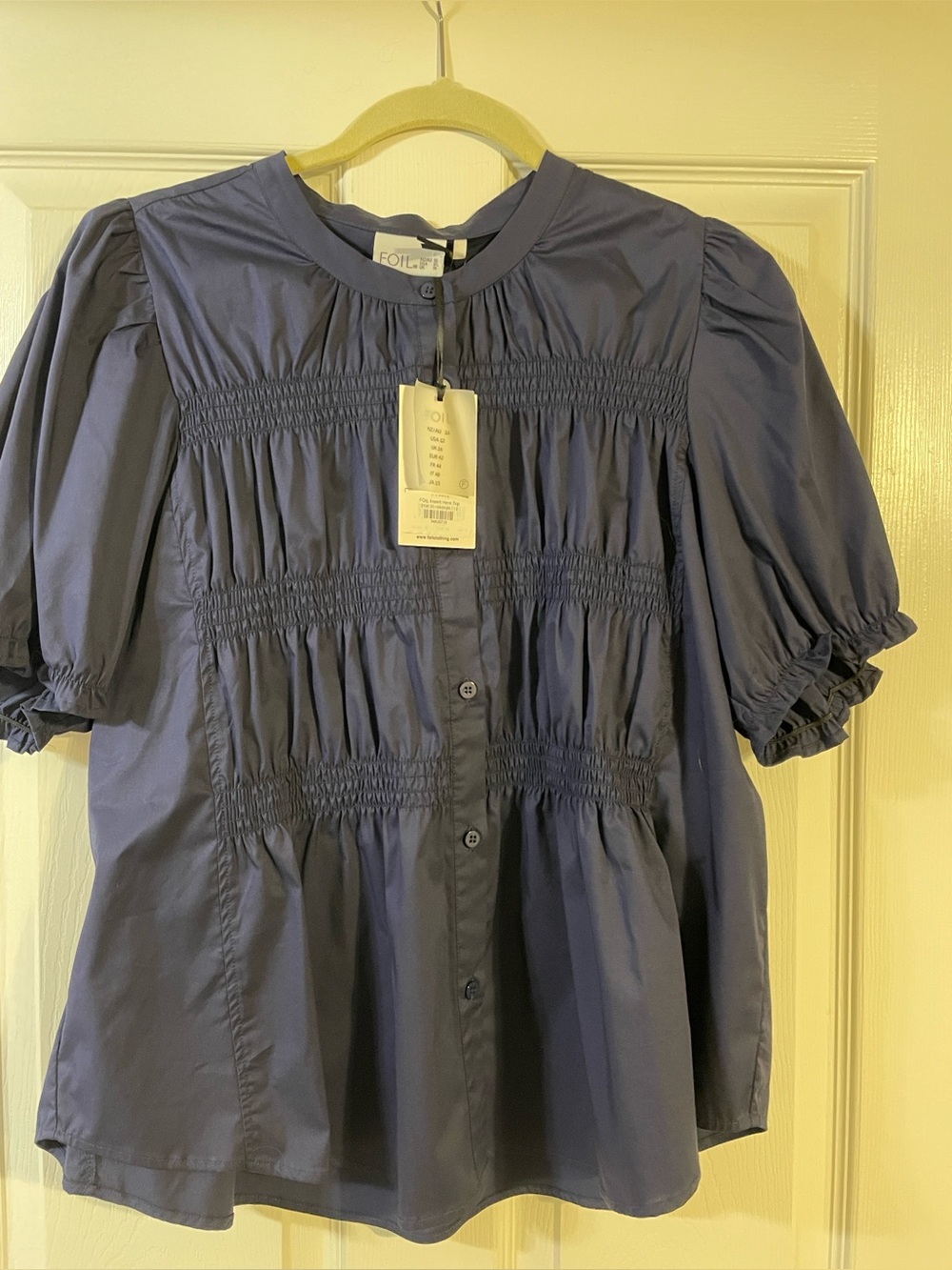 NWT Foil blouse.